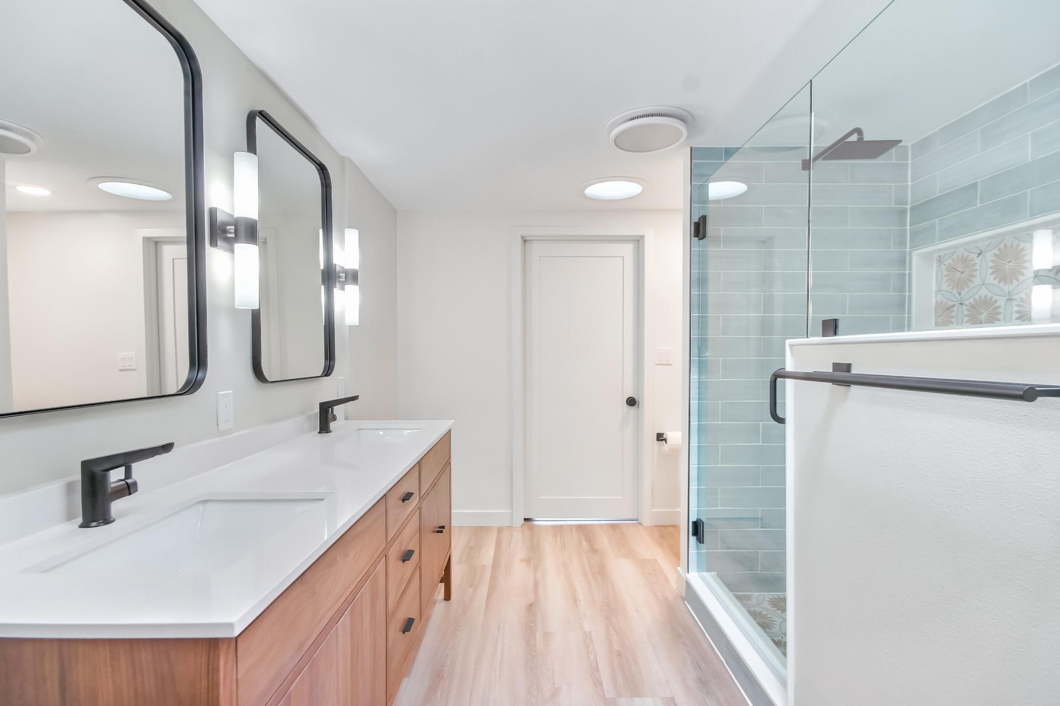 Custom double vanity bathroom remodel showing quality materials and craftsmanship in Enumclaw WA