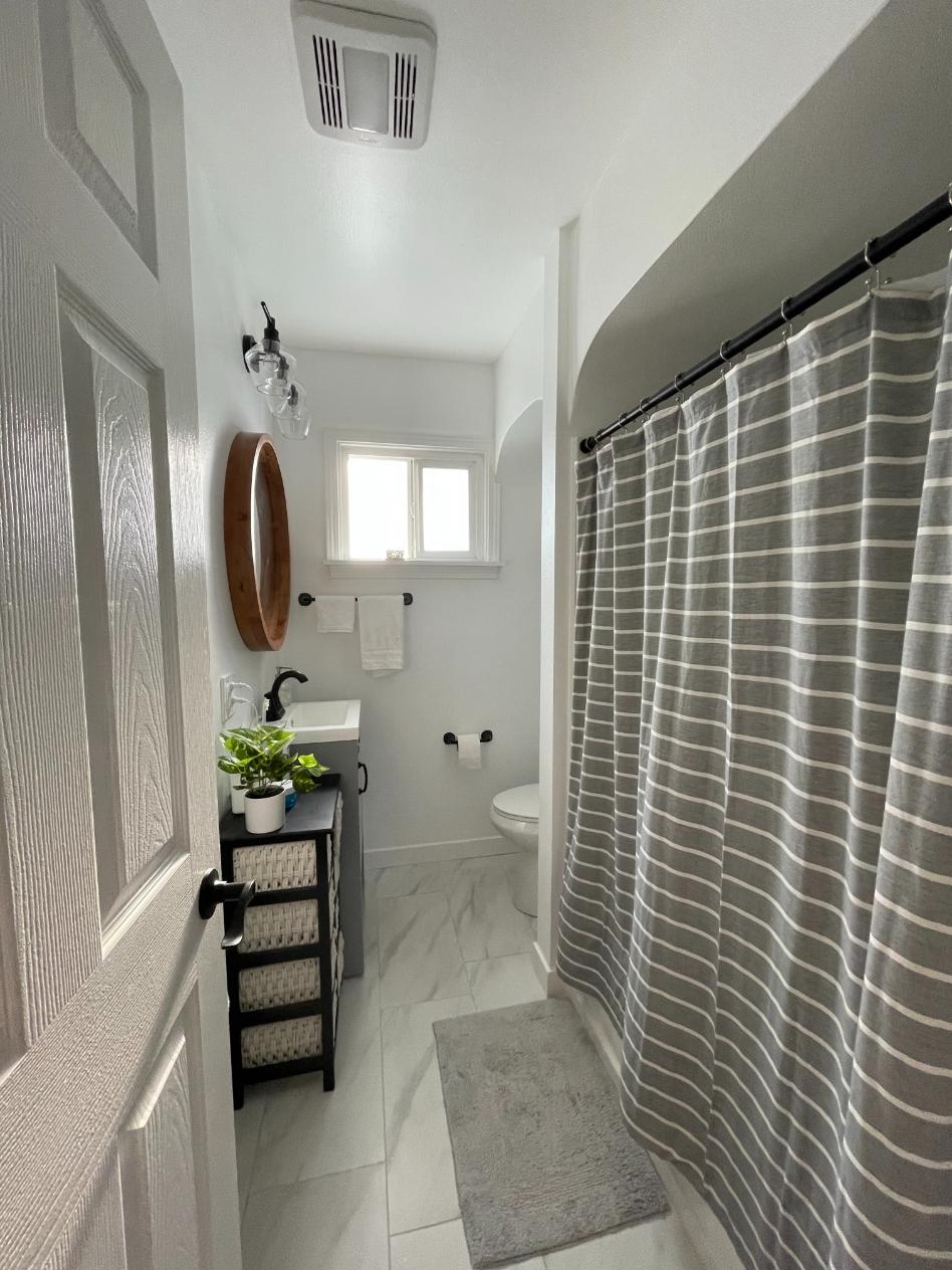 Professional bathroom remodel with modern tile and fixtures by Rainier Home Renovations in Enumclaw WA