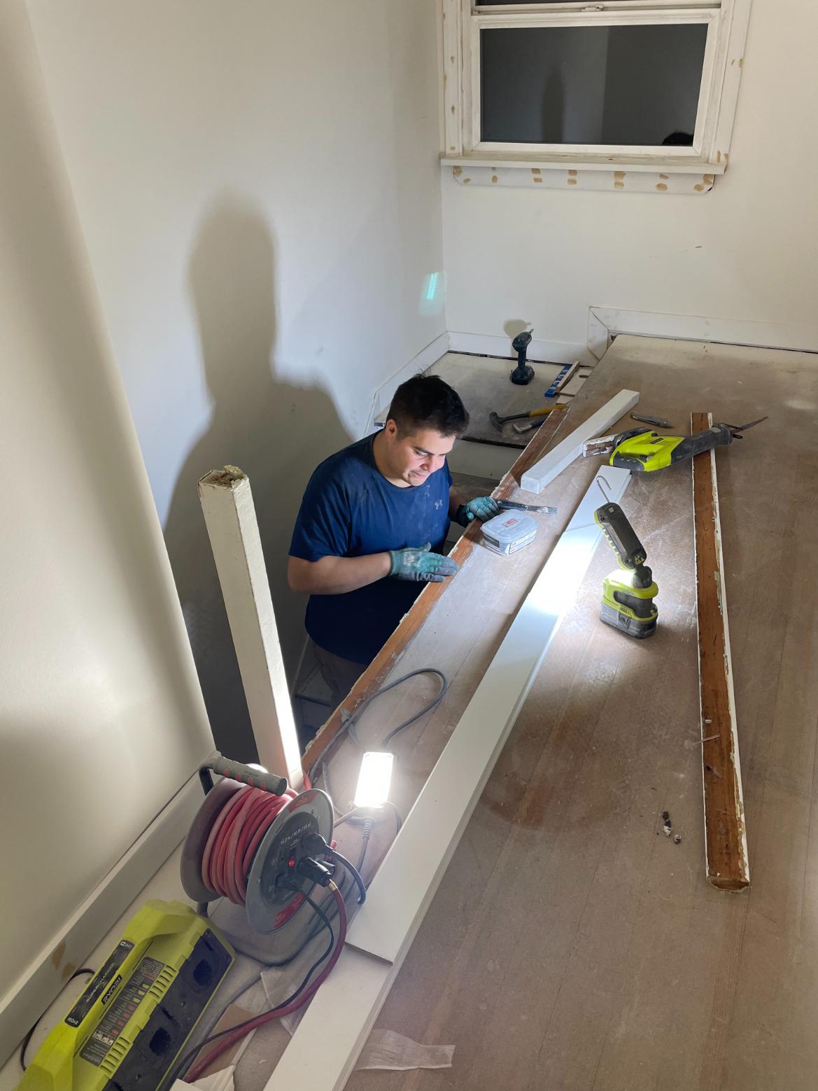 Custom doorway construction with header installation